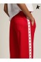 Golden Goose red sweatpants with stars on the side| Golden Goose red