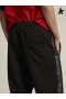 Golden Goose Game EDT Capsule collection joggers in black with logoed strips on the sides black