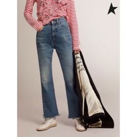 Golden Goose Golden collection ritagliata jeans svasati con un fluido di lavaggio blu