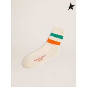 Poule aux œufs d'or Vieilli-finition des chaussettes blanches avec du vert et du orange rayures blanc
